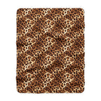 Leopard Print Sherpa Throw Blanket draped to show the leopard print