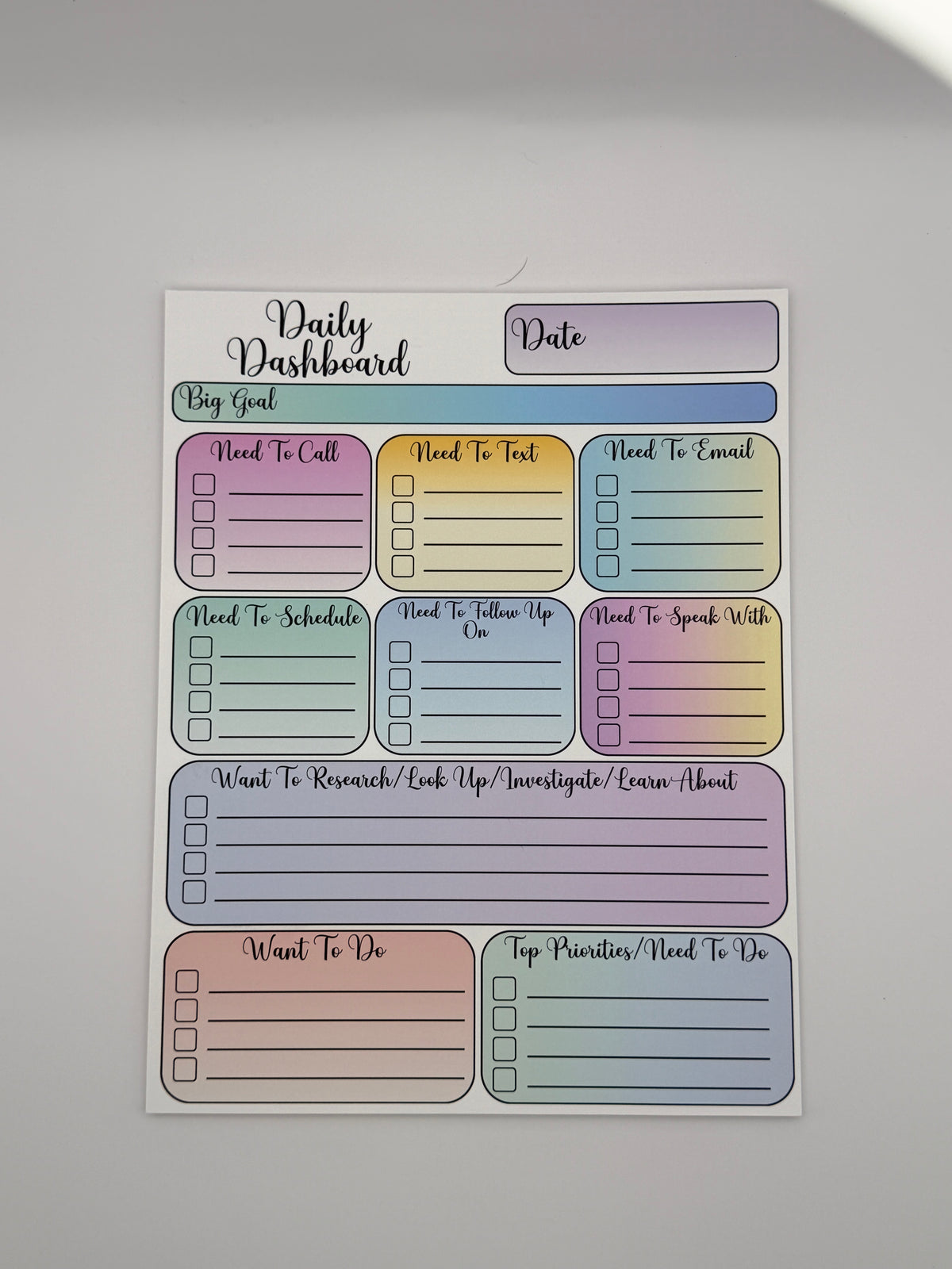Pastel Multicolor Daily Dashboard planning pad in the Classic layout with script lettering.