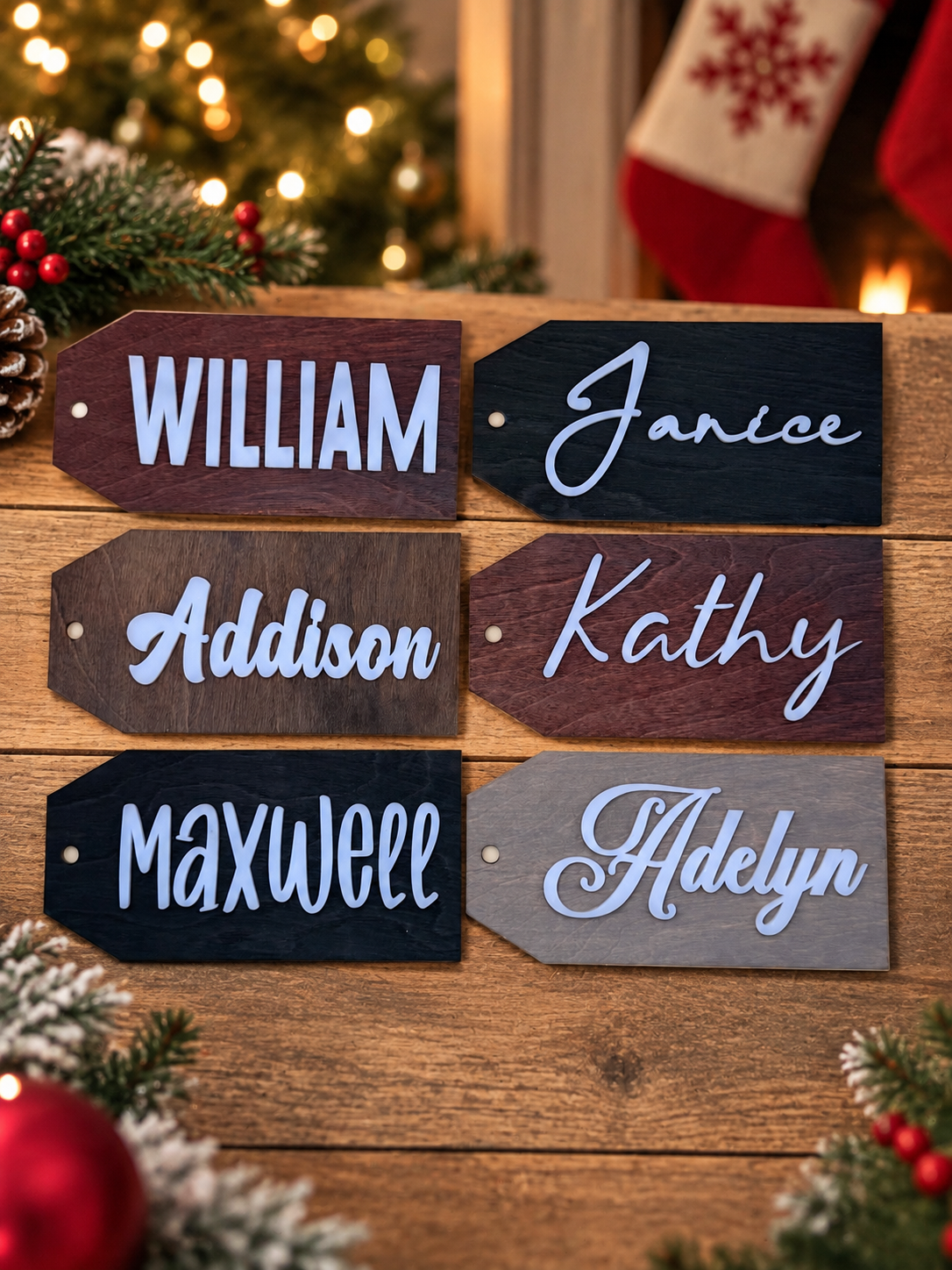Six personalized name tags showing engraved and layered lettering styles on stained wood